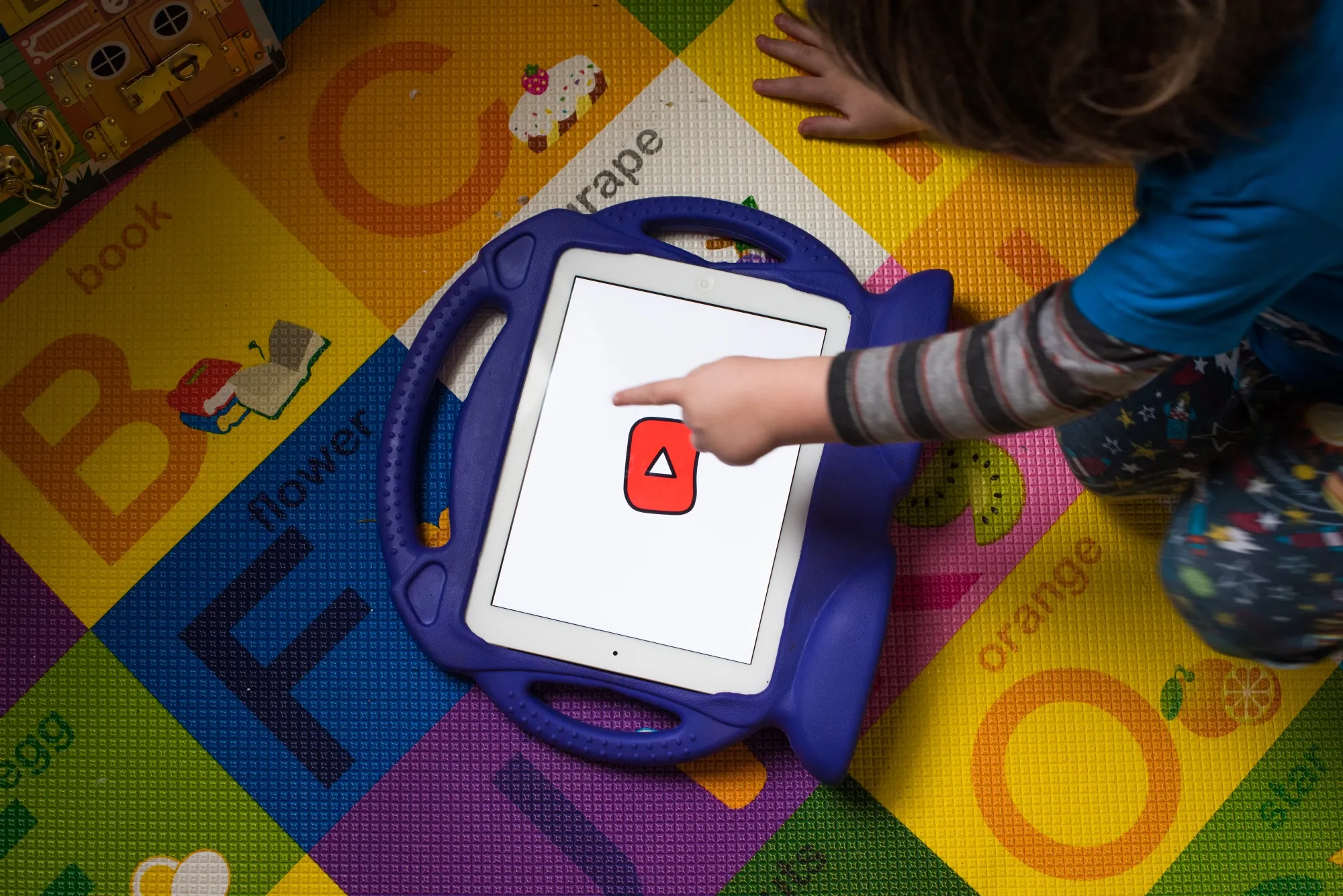 A child interacts with the YouTube Kids application.