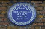 A plaque outside of Charles Dickens's former home on Doughty Street in London, now the Charles Dickens Museum. Dickens formed extensive networks in London journalism and the theater as he established himself as a novelist.