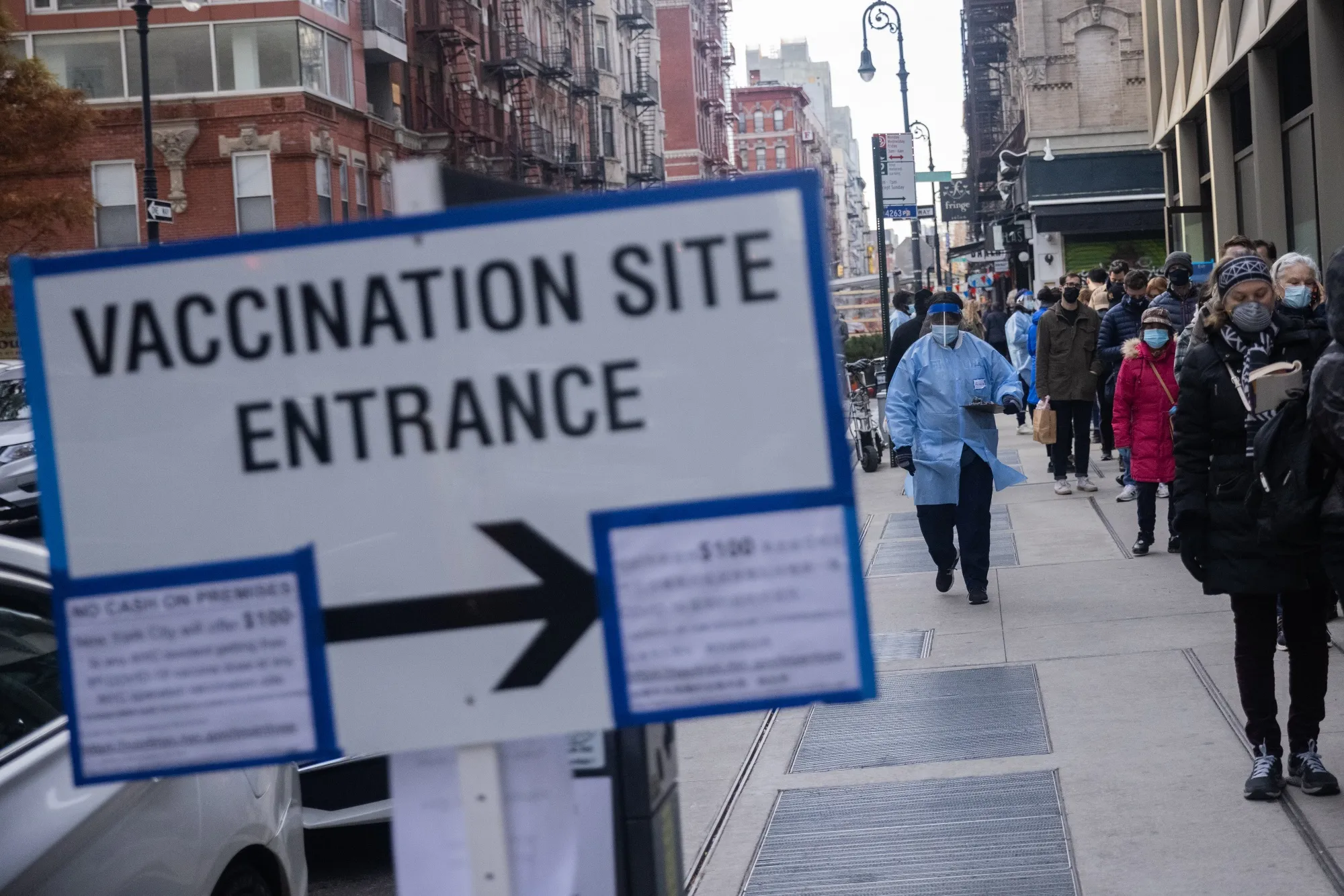 Residents wait in line at a Covid-19 vaccination site in New York, earlier in December. 