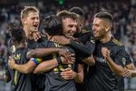Members of the LAFC celebrate a goal during a match on May 24.