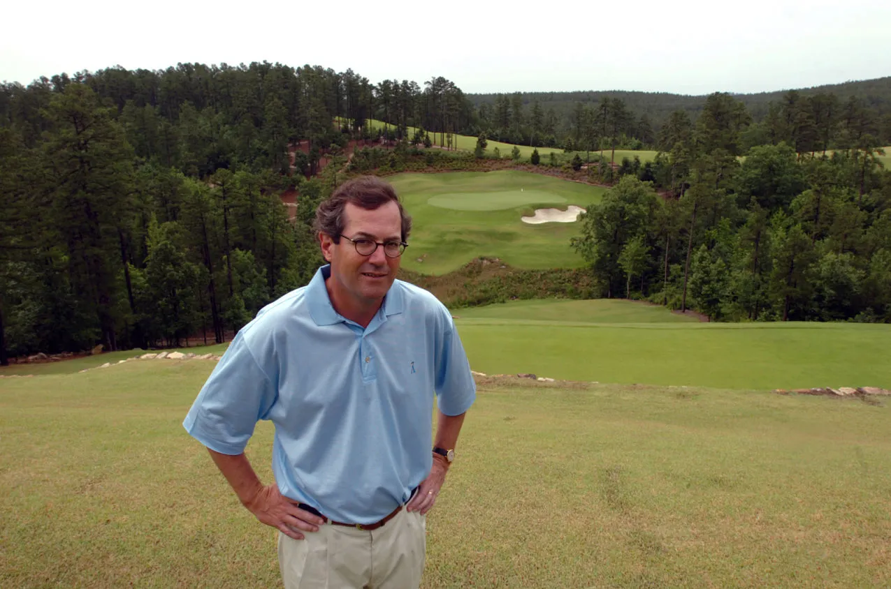 Alotian Golf Club owner Warren Stephens poses on the sixth hole tee box of the course on Wednesday, May 30, 2006 in Roland, Arkansas.
