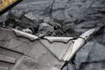 Coal in an excavator bucket at a coal mine in Mezhdurechensk, Russia.
