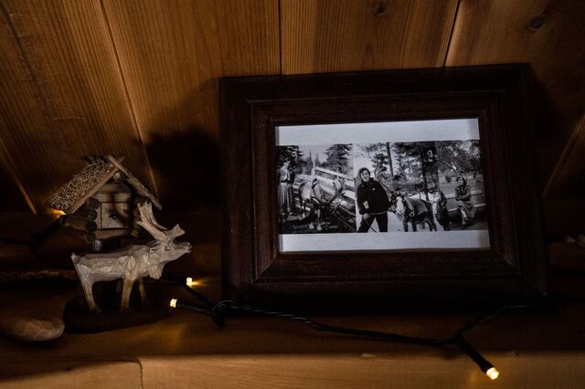 Framed black and white photo and reindeer trinkets