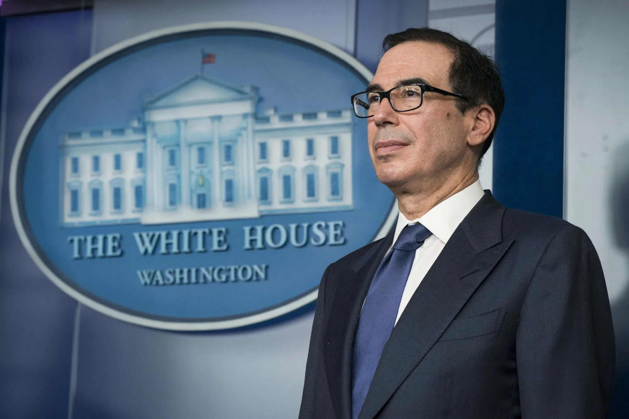 Steven Mnuchin listens during a news conference at the White House in Washington, D.C. on March 25.