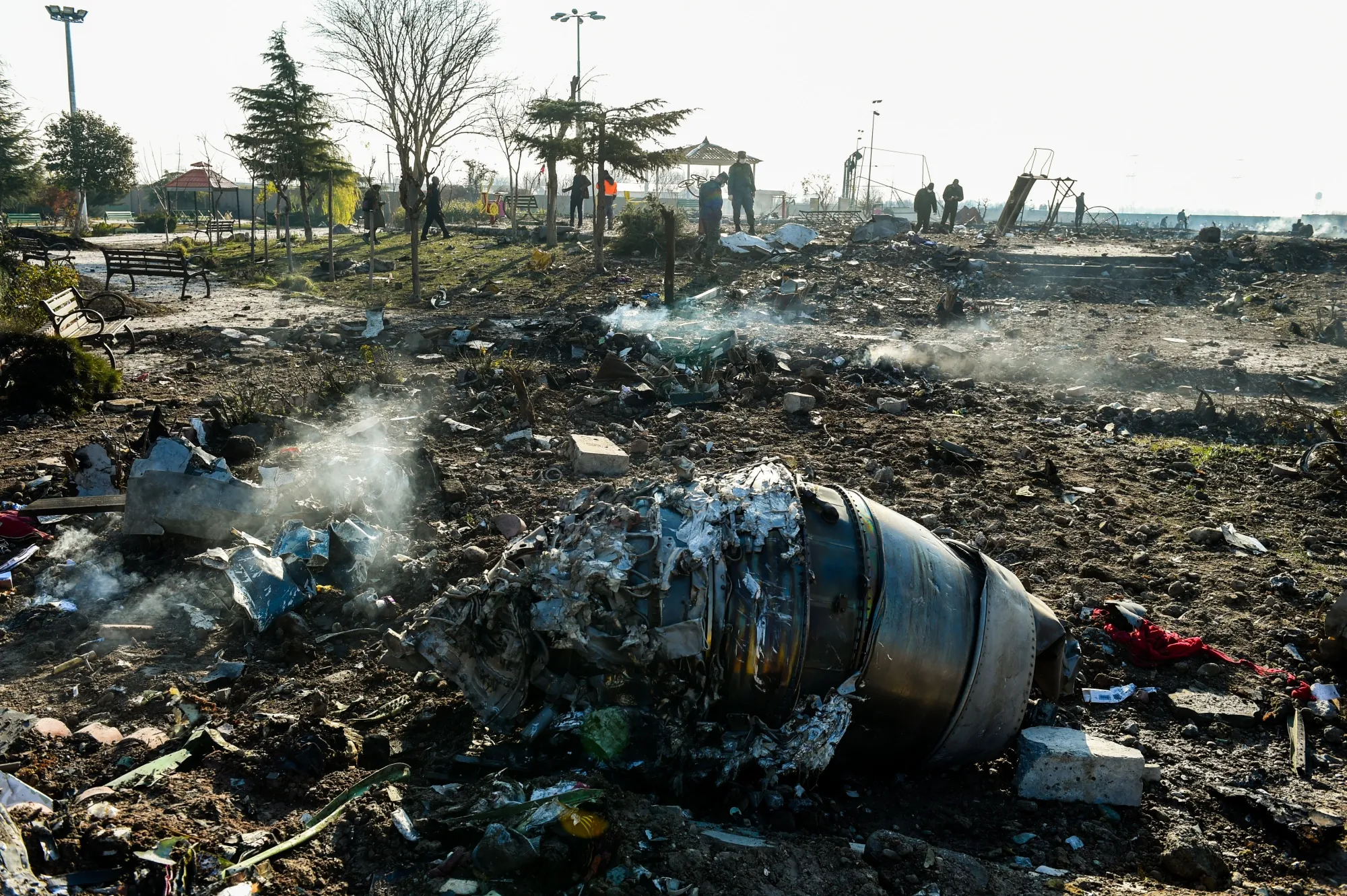 Aircraft parts from the wreckage of a Boeing Co. 737-800 aircraft, operated by Ukraine International Airlines, which crashed shortly after takeoff lie on the ground near Shahedshahr, Iran, on Jan. 8.