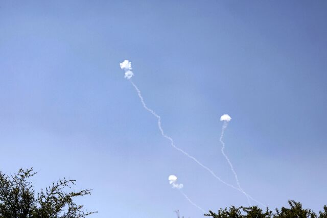 Rockets fired from southern Lebanon are intercepted by Israel's Iron Dome air defense system over the Golan Heights on May 16.