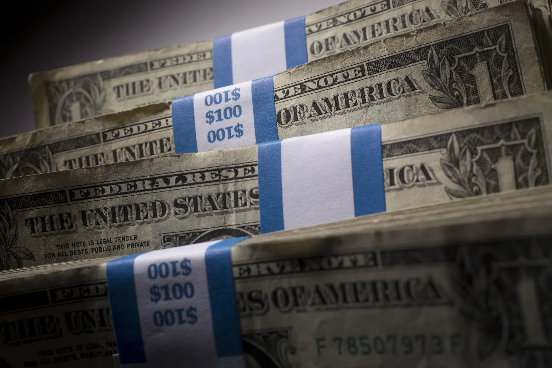 Stacks of U.S. one-dollar bills.