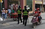 Police officers patrolling in Kashgar, in China’s western Xinjiang region on June 4.