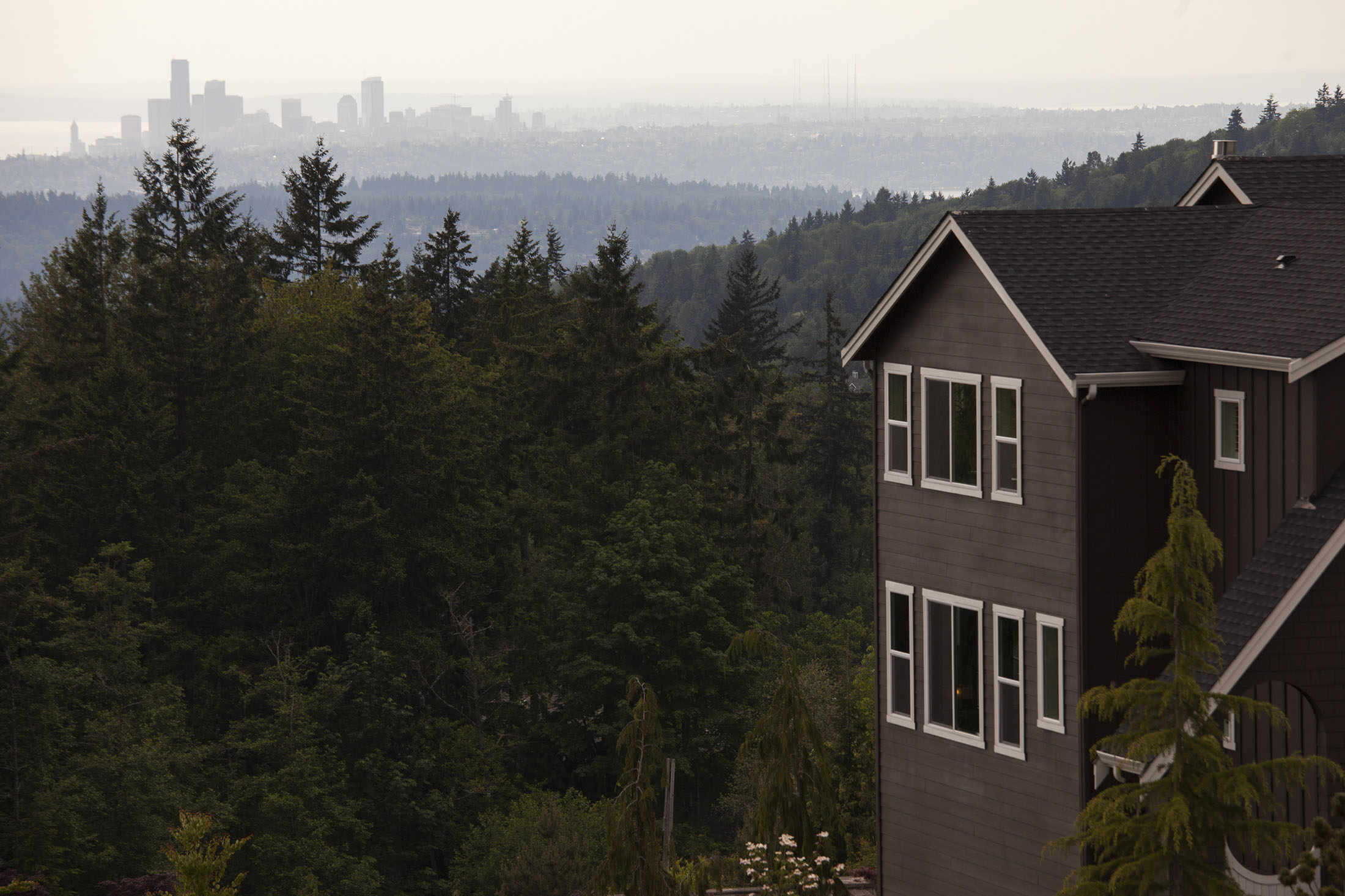 A view of Seattle is seen from the balcony of a house in Bellevue, Washington.
