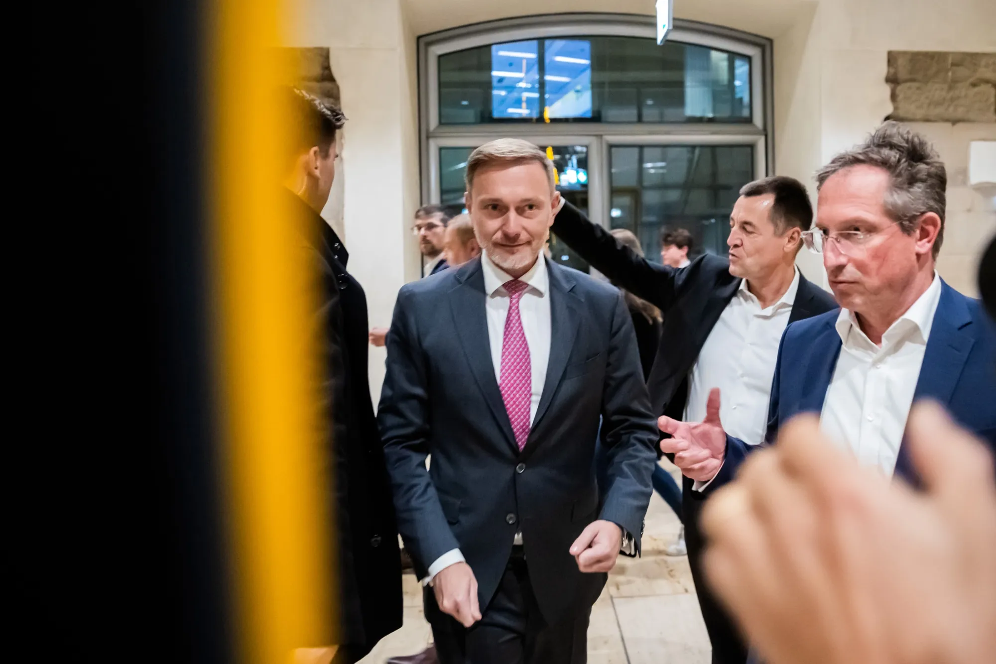 Christian Lindner, center, departs the Reichstag building following his dismissal on Nov. 6.