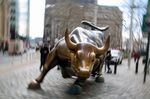 The famous bull sculpture stands near Wall Street in New York, U.S., on Friday, Feb. 12, 2016.
