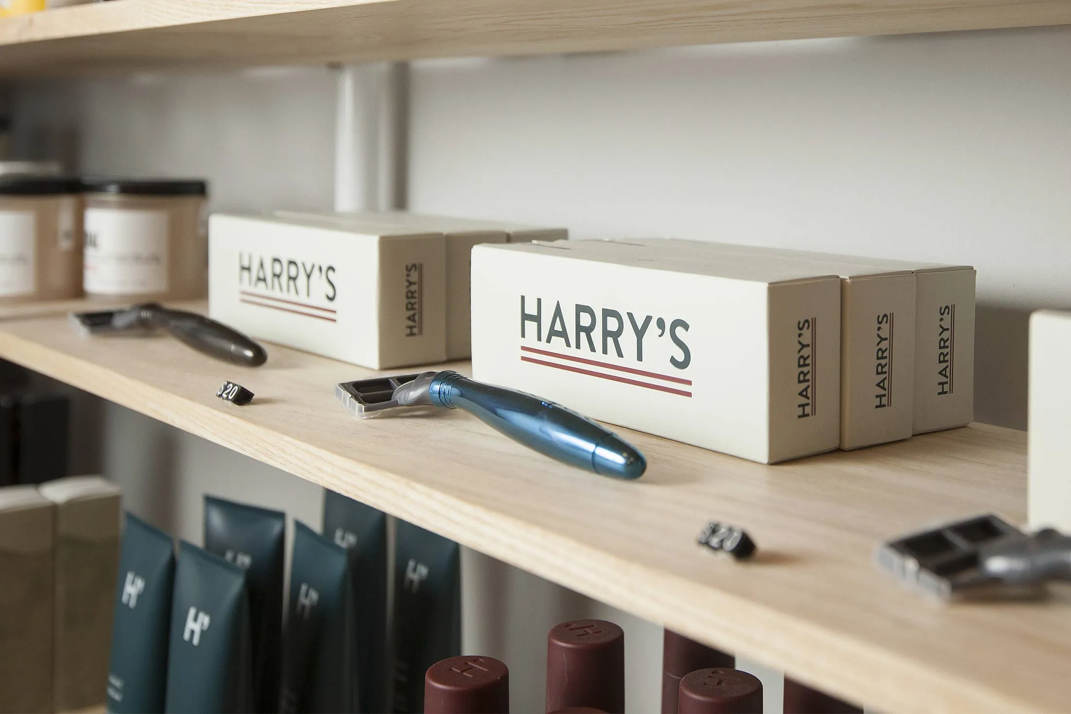Products inside a brick-and-mortar store for Harry's, the online purveyor of subscription shaving razors and other grooming items primarily for men, in New York, Dec. 2, 2014.&nbsp;
