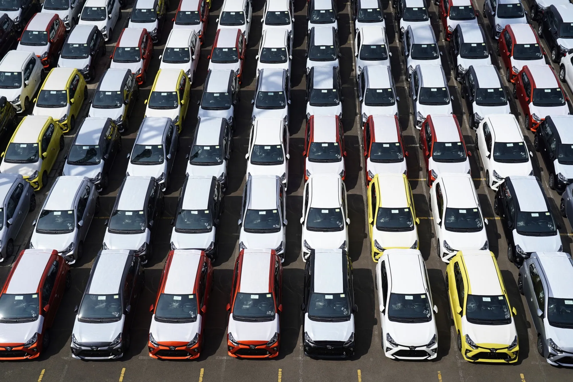 Toyota Motor Corp. vehicles for export at a port in Jakarta, Indonesia.