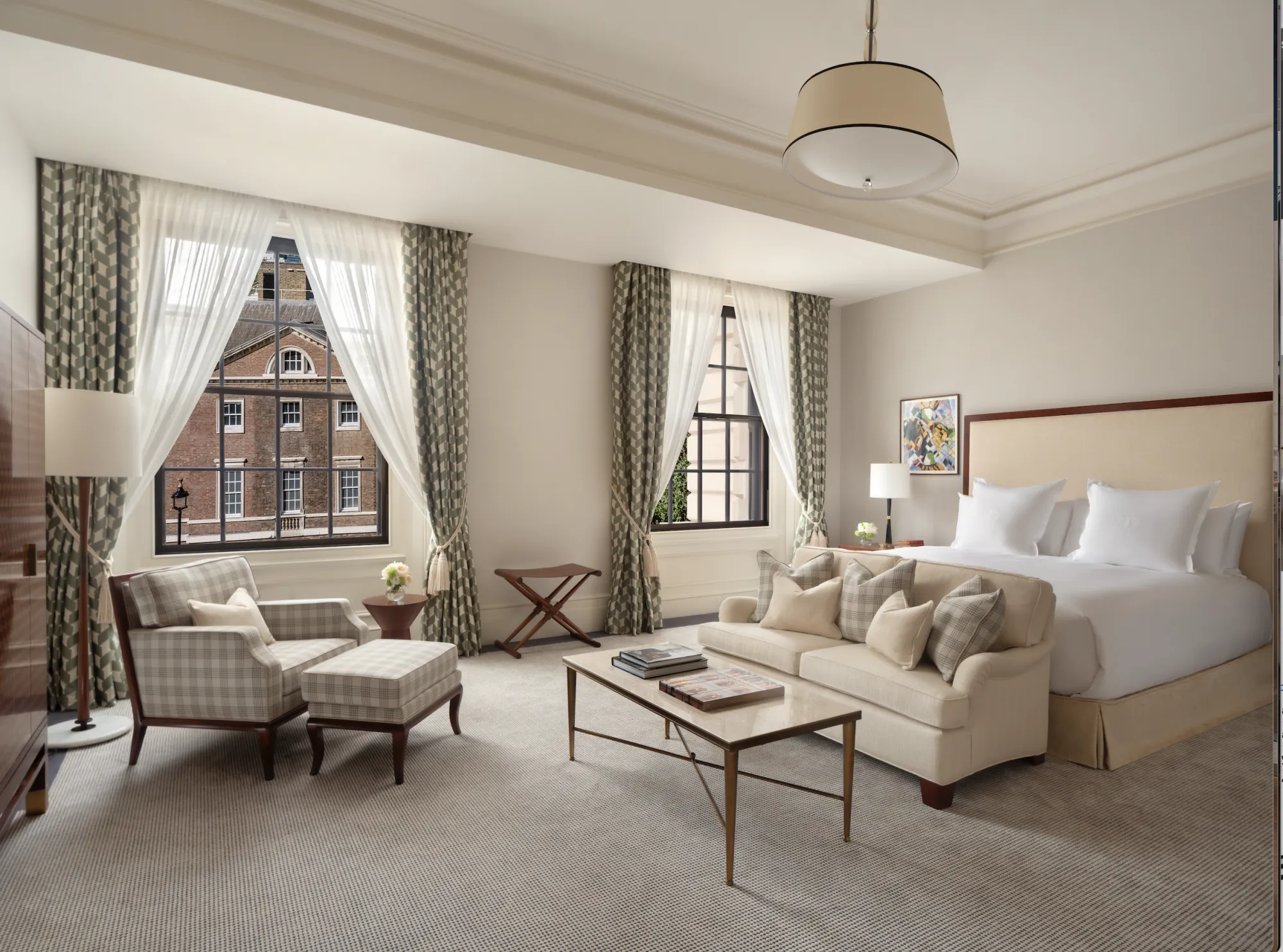 A junior suite at the Raffles London, with views over historic Whitehall.