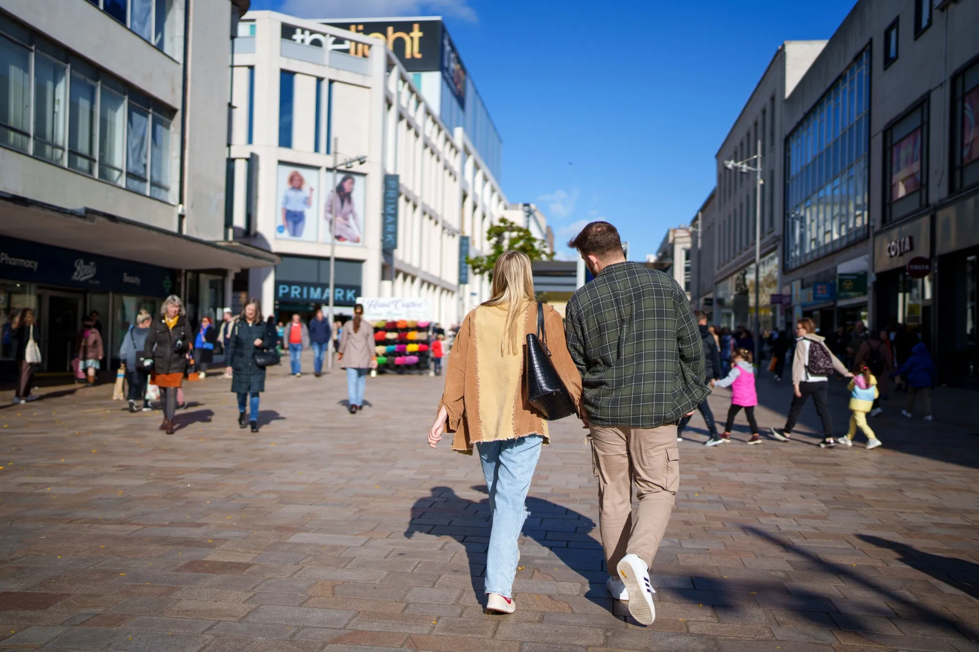 Pedestrians on The Moor pedestrianised street in Sheffield, UK.