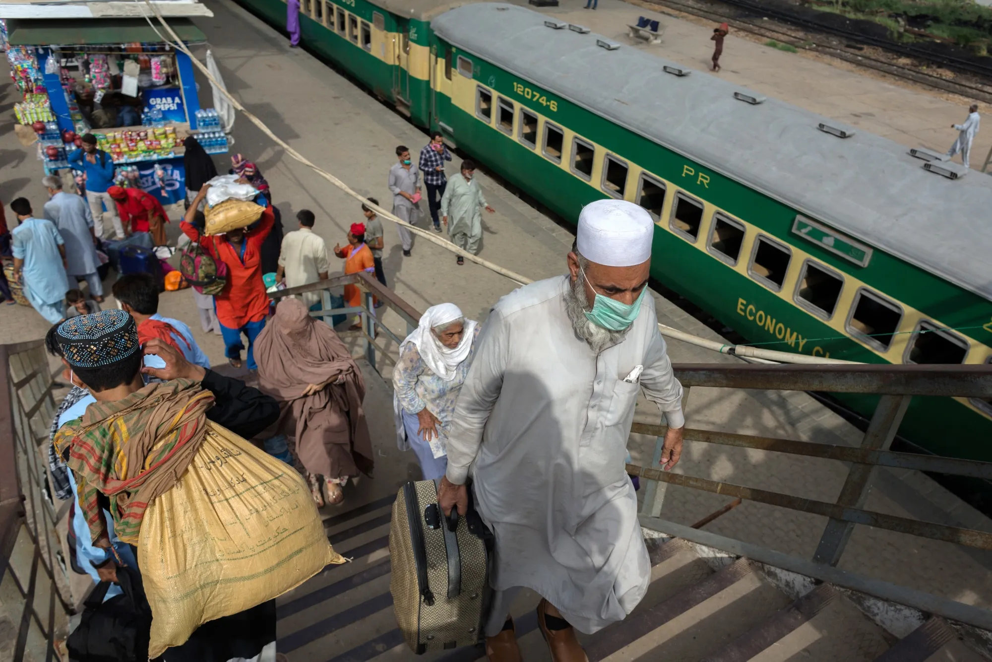 Travelers in Karachi.