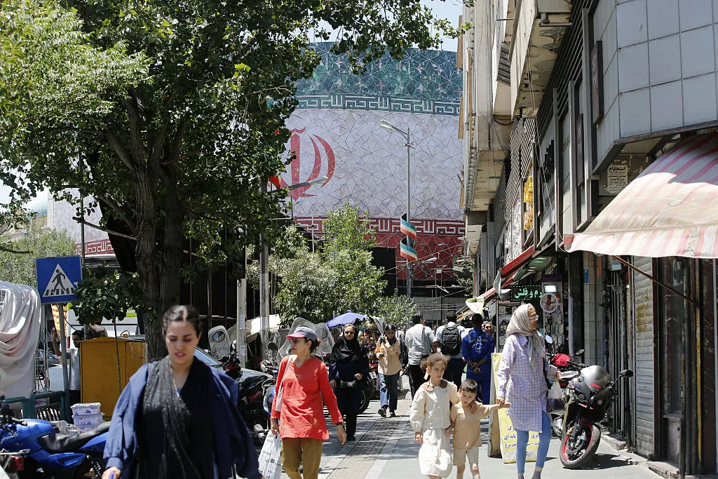 China 'actively committed' to Iran talks as US prepares economic isolation plan; Trump threatens Tehran's trading partners