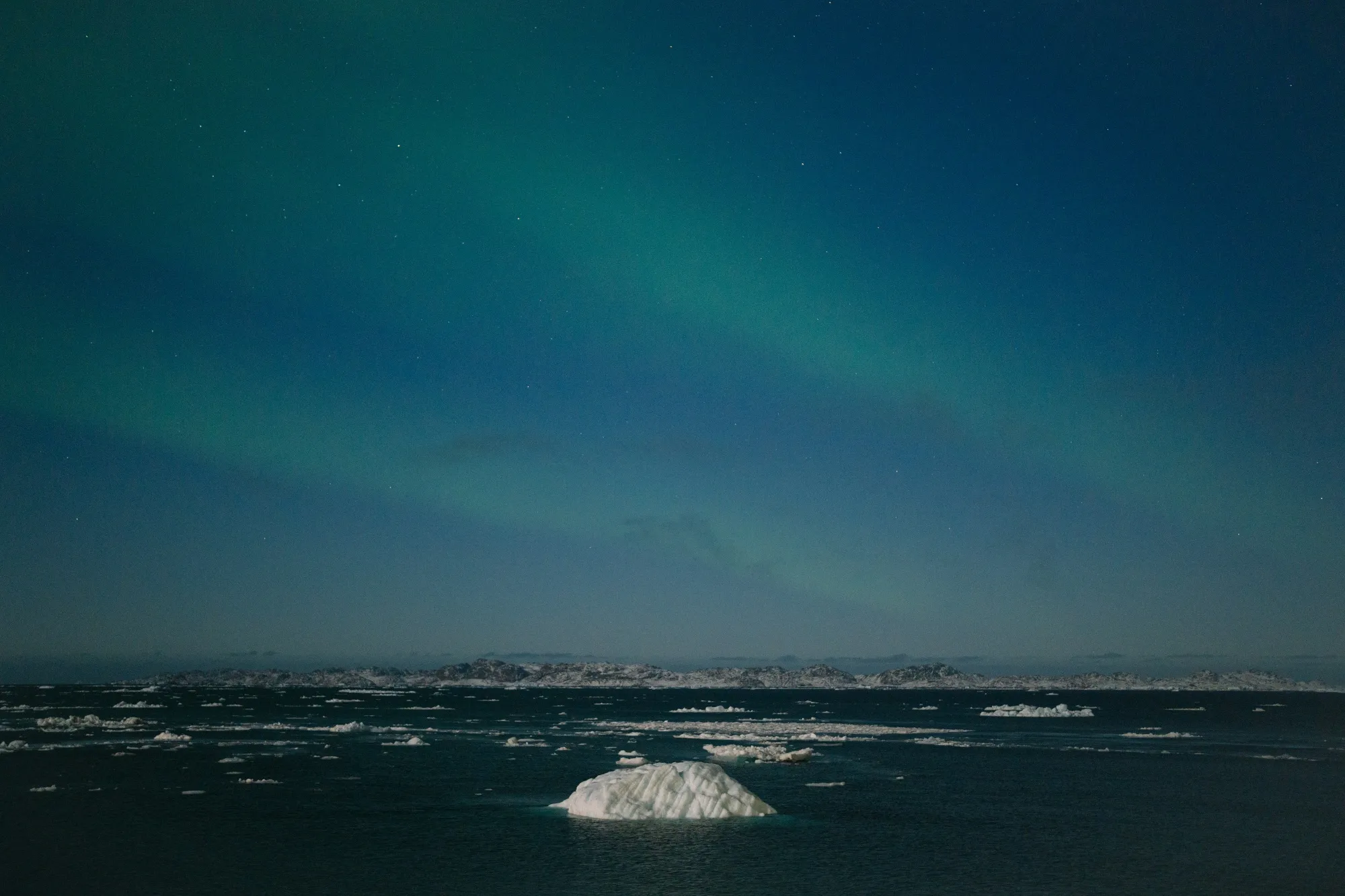 Northern lights over sea ice in Greenland.