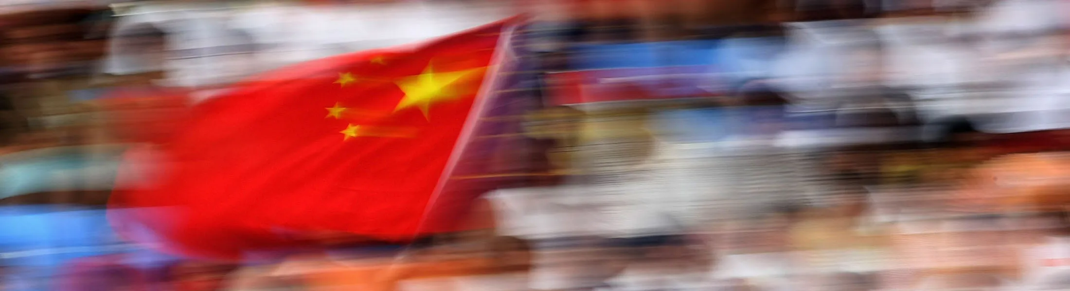 SHENYANG, CHINA - AUGUST 10: A flag is waved by Chinese fans during the Men's First Round Group C match between New Zealand and Brazil in Shenyang Olympic Stadium on Day 2 of the Beijing 2008 Olympic Games on August 10, 2008 in Shenyang, China.
