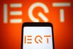 In this photo illustration an EQT (EQT Partners AB) logo of