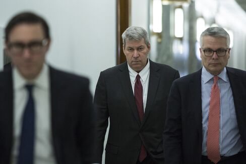 Pearson, center, in Washington on April 18.