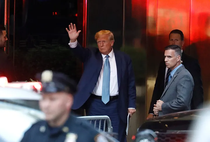 Former President Donald Trump arrives at Trump Tower following a deposition at the office of the NY Attorney General on April 13.