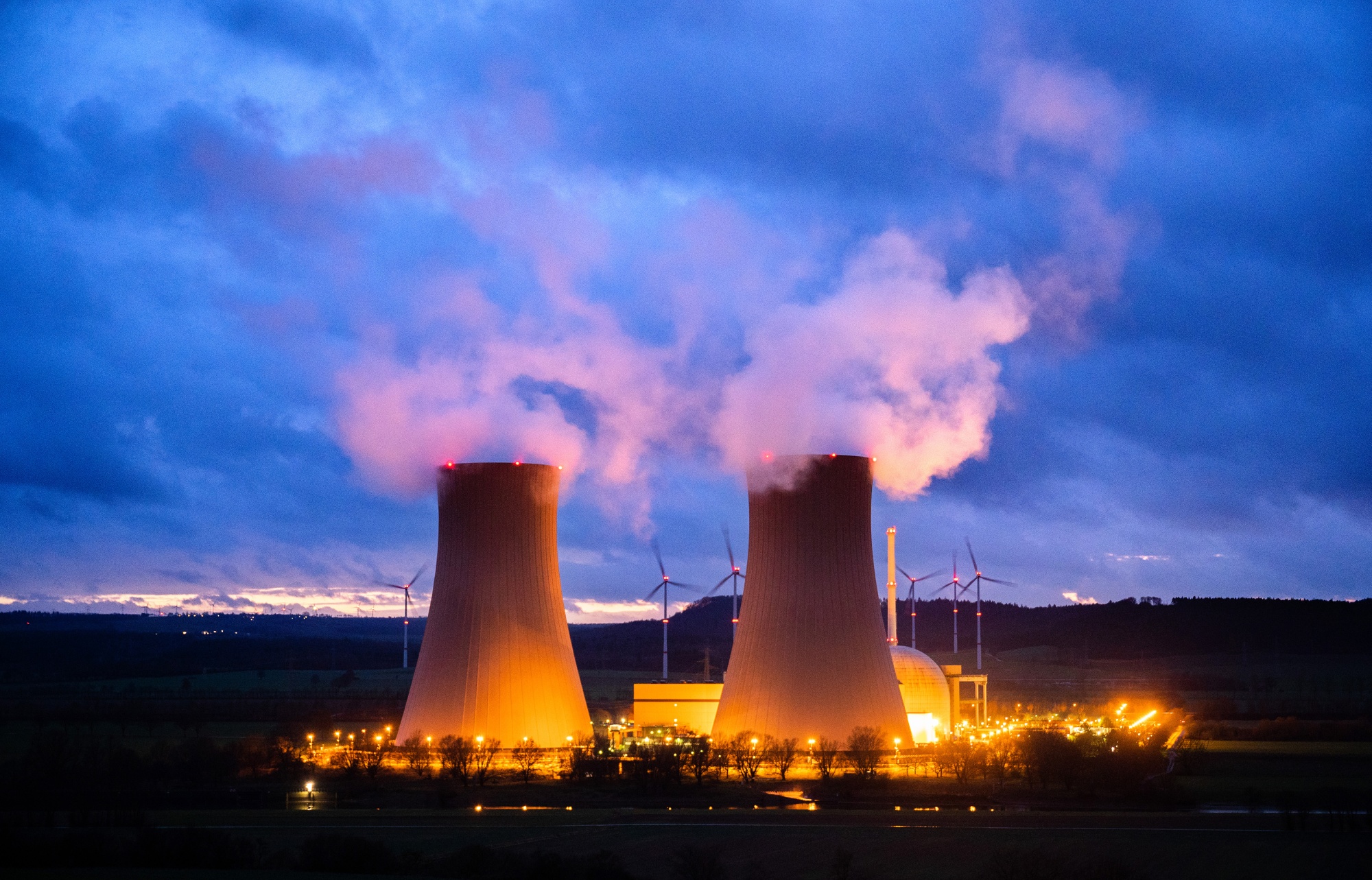 Wind turbines at Germany’s Grohnde nuclear power plant, which was taken off the grid on Dec. 31, 2021. &nbsp;