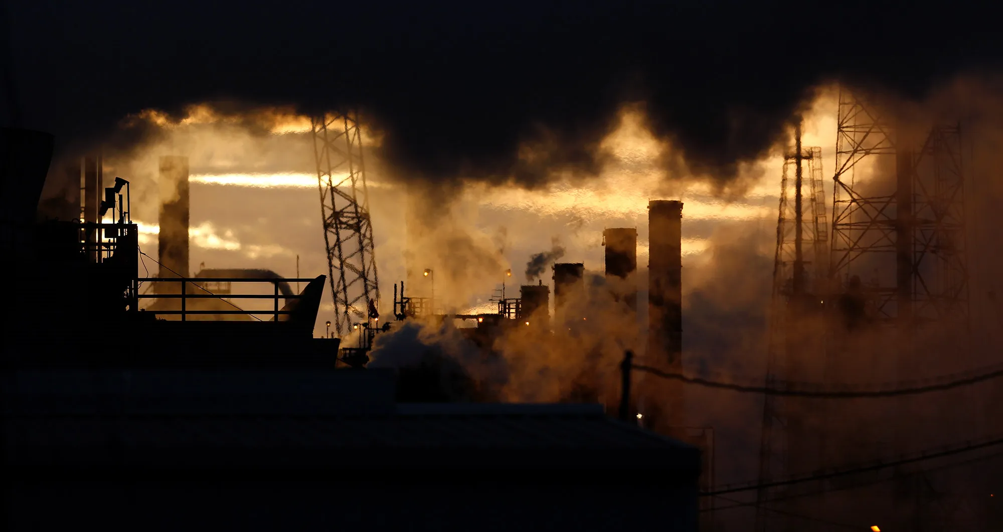 Emissions rise from a refinery