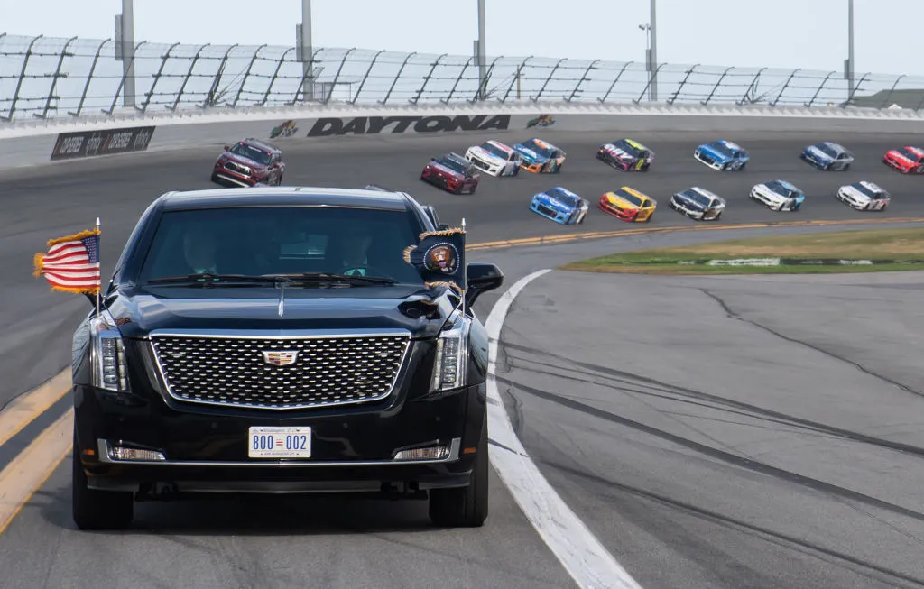 President Donald Trump&nbsp;rides in the presidential limousine in a pace lap ahead of the start of the Daytona 500 Nascar race at Daytona International Speedway in Daytona Beach, Florida, February 16, 2020.&nbsp;