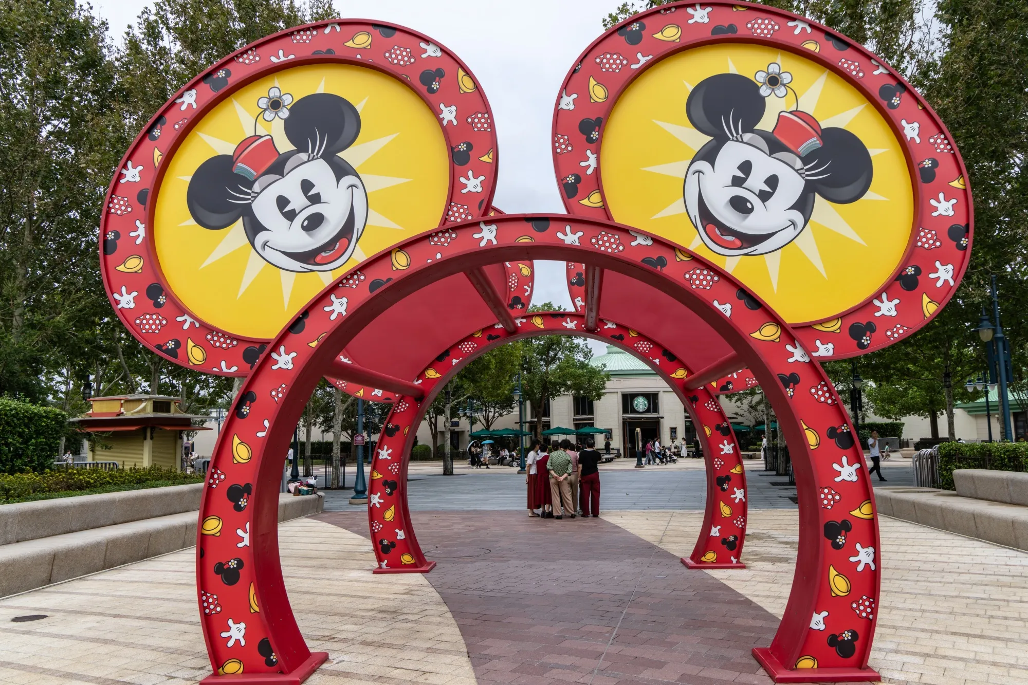 Arches in the shape of Mickey Mouse's ears at Walt Disney Co.'s Shanghai Disneyland Resort in Shanghai, China, on Wednesday, Sept. 25, 2024. Theme parks are one business that could suffer from any economic uncertainty.