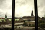 The old stock exchange building, left, and Christiansborg Palace sit on the city skyline seen from the headquarters of the Danish central bank in Copenhagen.