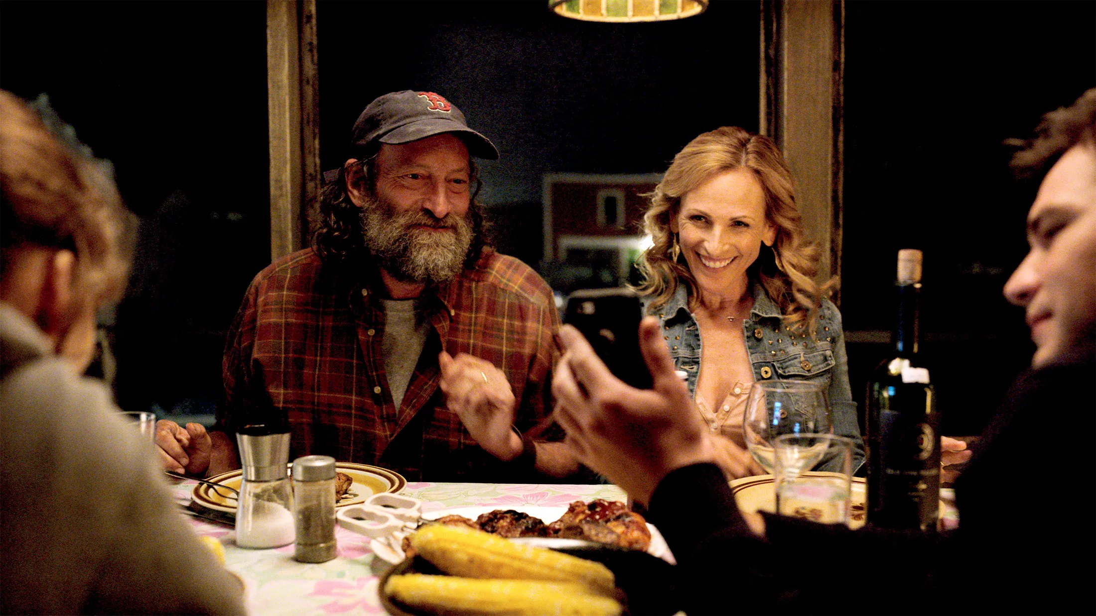 Troy Kotsur, left, and Marlee Matlin in a scene from “CODA.” 