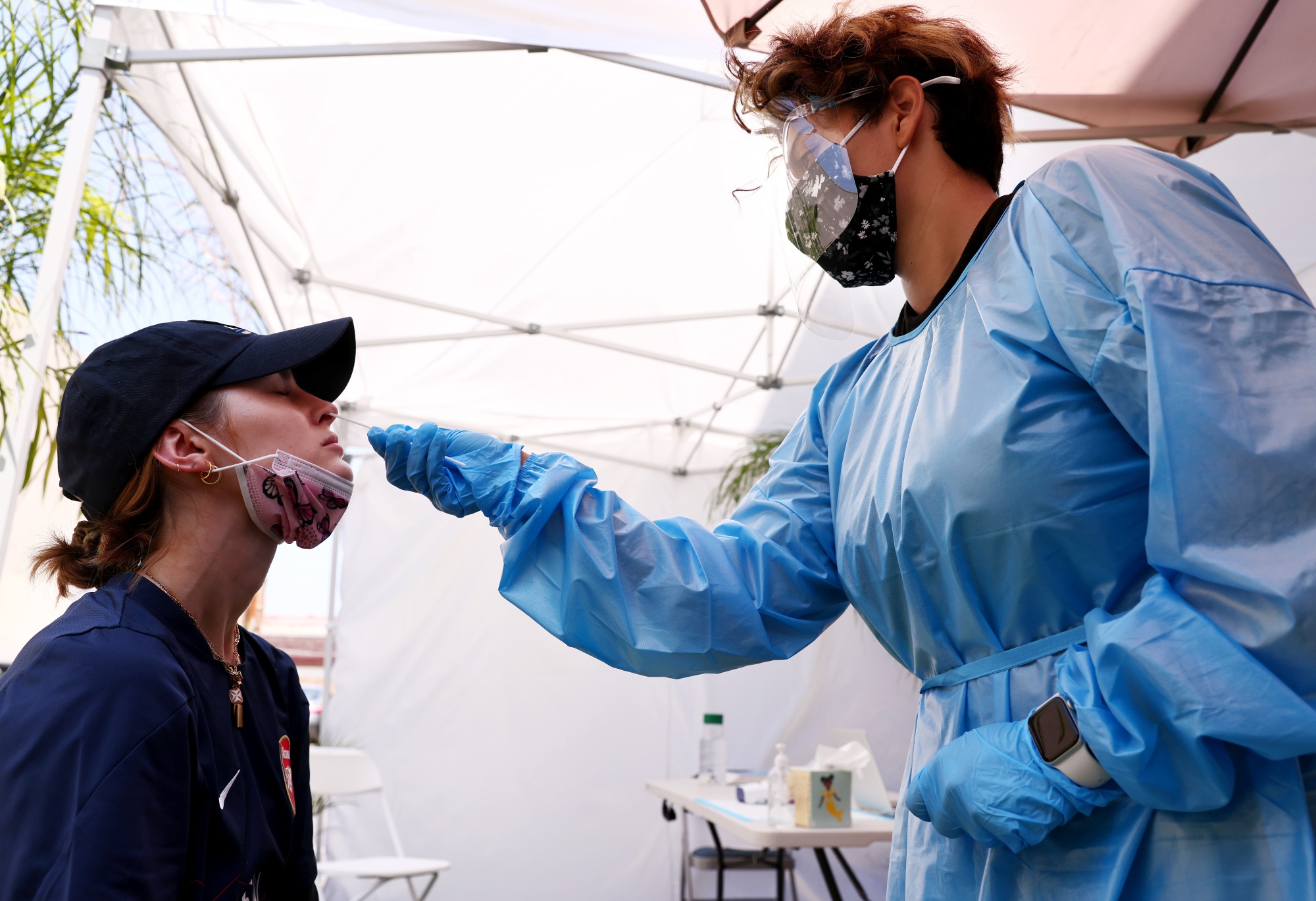 A medical assistant administers a Covid-19 test&nbsp;in Los Angeles, California.