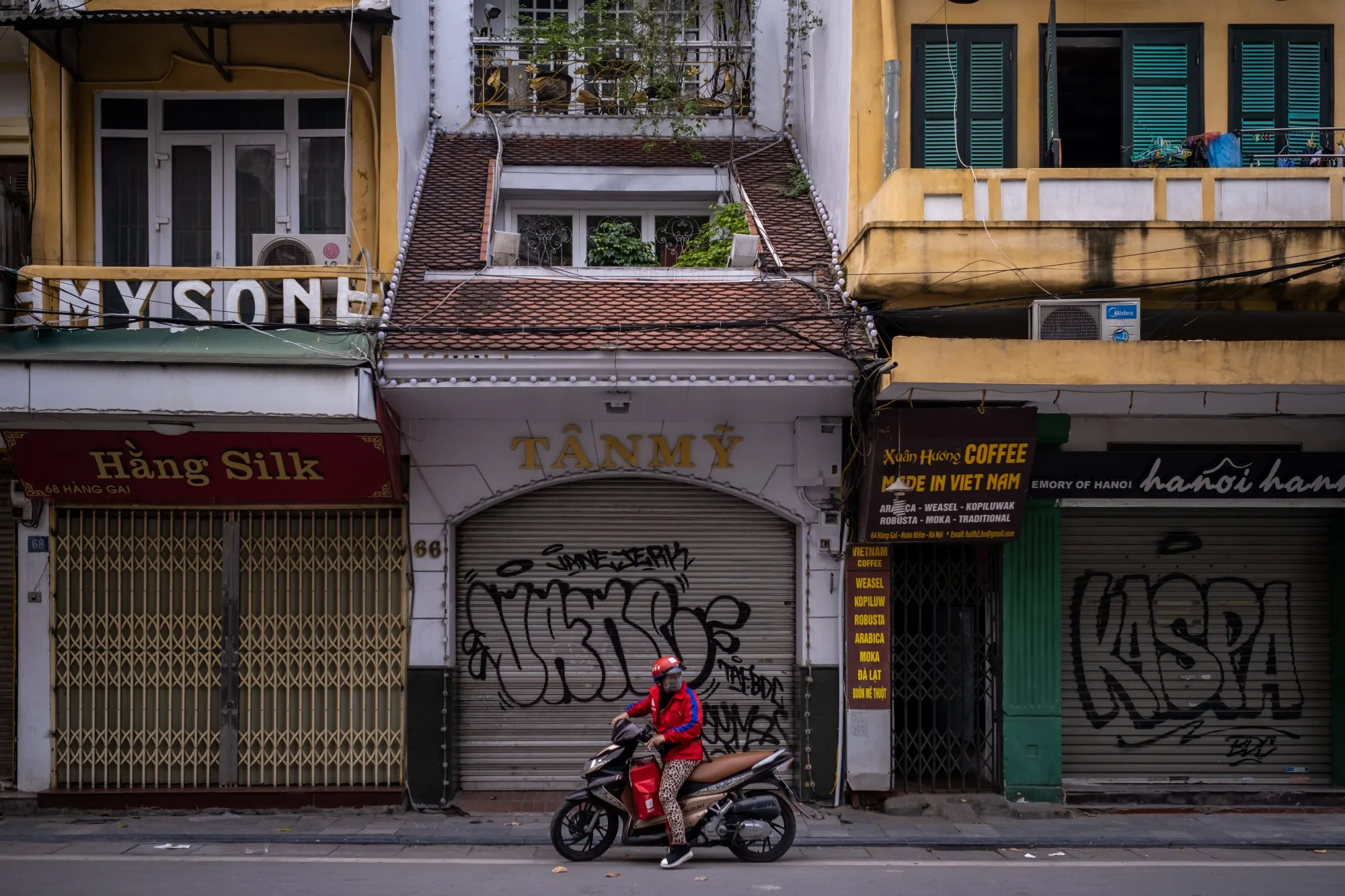 Shops at the Old Quarter, a popular area normally packed with tourists, in Hanoi are closed amid concerns of the spread of the coronavirus on March 26.