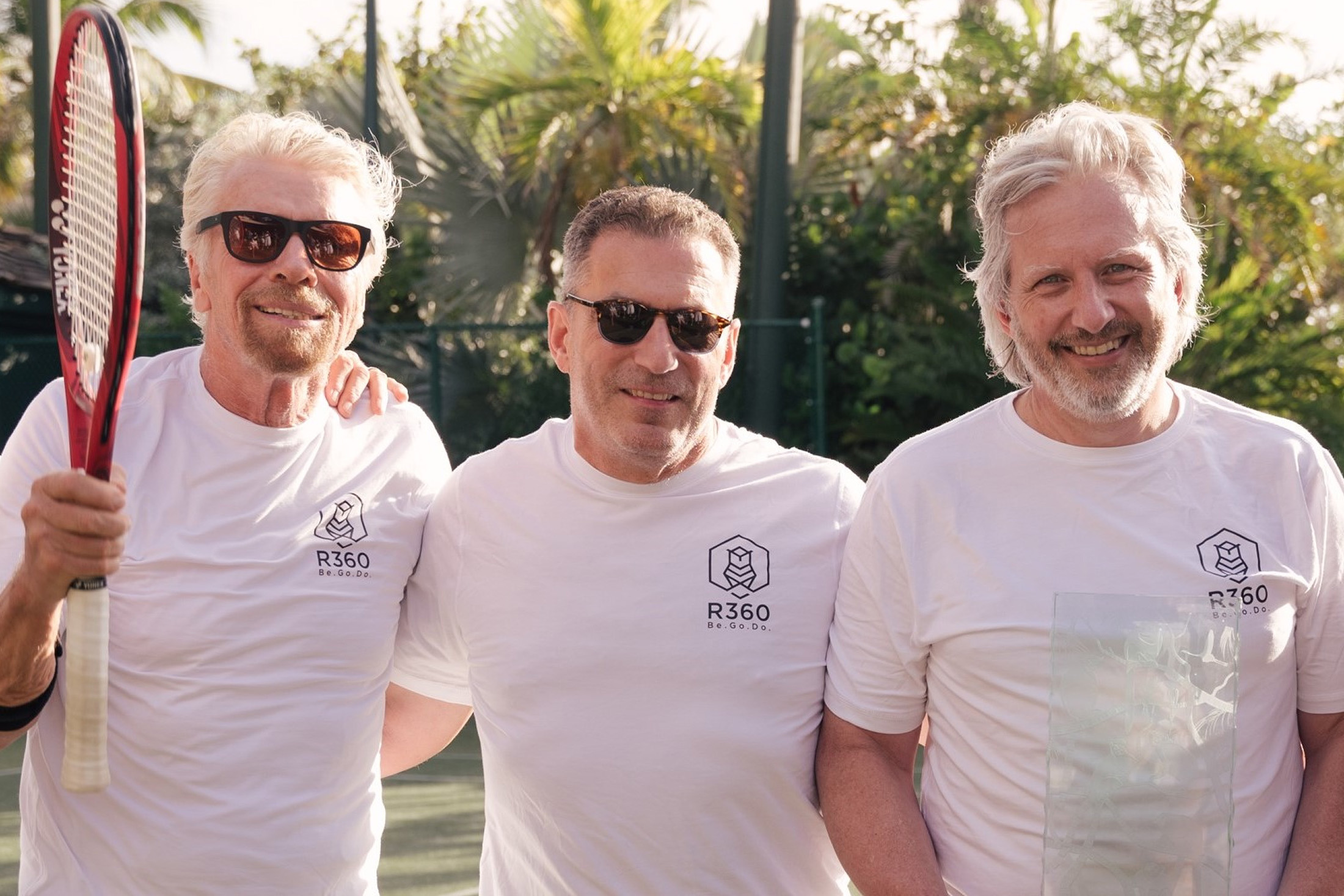 Richard Branson, from left, during an R360 networking tennis match with Michael Cole and Christopher Ryan, a former Tiger 21 chair in Texas and Puerto Rico and chief executive officer of&nbsp;GoBundance, a professional networking group.