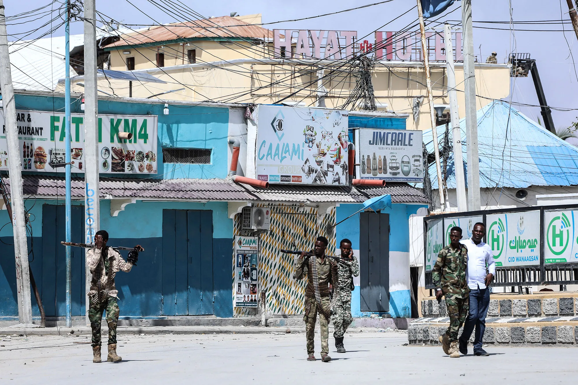 Security officers patrol near the the site of explosions in Mogadishu on Aug.&nbsp;20.