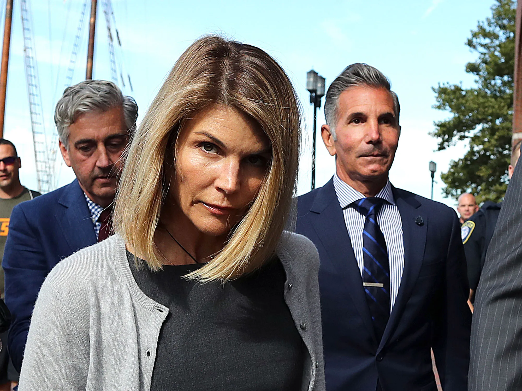 Lori Loughlin and Mossimo Giannulli, right, leave court&nbsp;in Boston in&nbsp;2019.