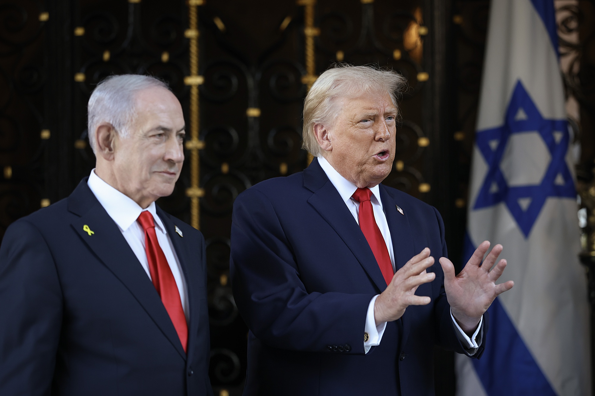 PALM BEACH, FLORIDA - DECEMBER 29: U.S. President Donald Trump welcomes Israeli Prime Minister Benjamin Netanyahu to his Mar-a-Lago club on December 29, 2025 in Palm Beach, Florida. The two leaders are scheduled to hold a bilateral meeting to discuss regional security in the Middle East as well as the U.S.-Israel partnership. (Photo by Joe Raedle/Getty Images) Photographer: Joe Raedle/Getty Images North America