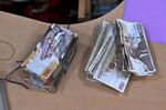 Old and new-issue currency bills in Nairobi, Kenya. 