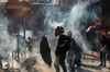 HONG KONG, CHINA - OCTOBER 01: Pro-democracy protesters clash with police during a demonstration in Wong Tai Sin district on October 1, 2019 in Hong Kong, China. Pro-democracy protesters marked the 70th anniversary of the founding of the People's Republic of China in Hong Kong through demonstrations as the city remains on the edge with the anti-government movement entering its fourth month. Protesters in Hong Kong continue its call for Chief Executive Carrie Lam to meet their remaining demands since the controversial extradition bill has been withdrawn, which includes an independent inquiry into police brutality, the retraction of the word ìriotî to describe the rallies, and genuine universal suffrage, as the territory faces a leadership crisis. (Photo by Anthony Kwan/Getty Images) Getty Images AsiaPac
