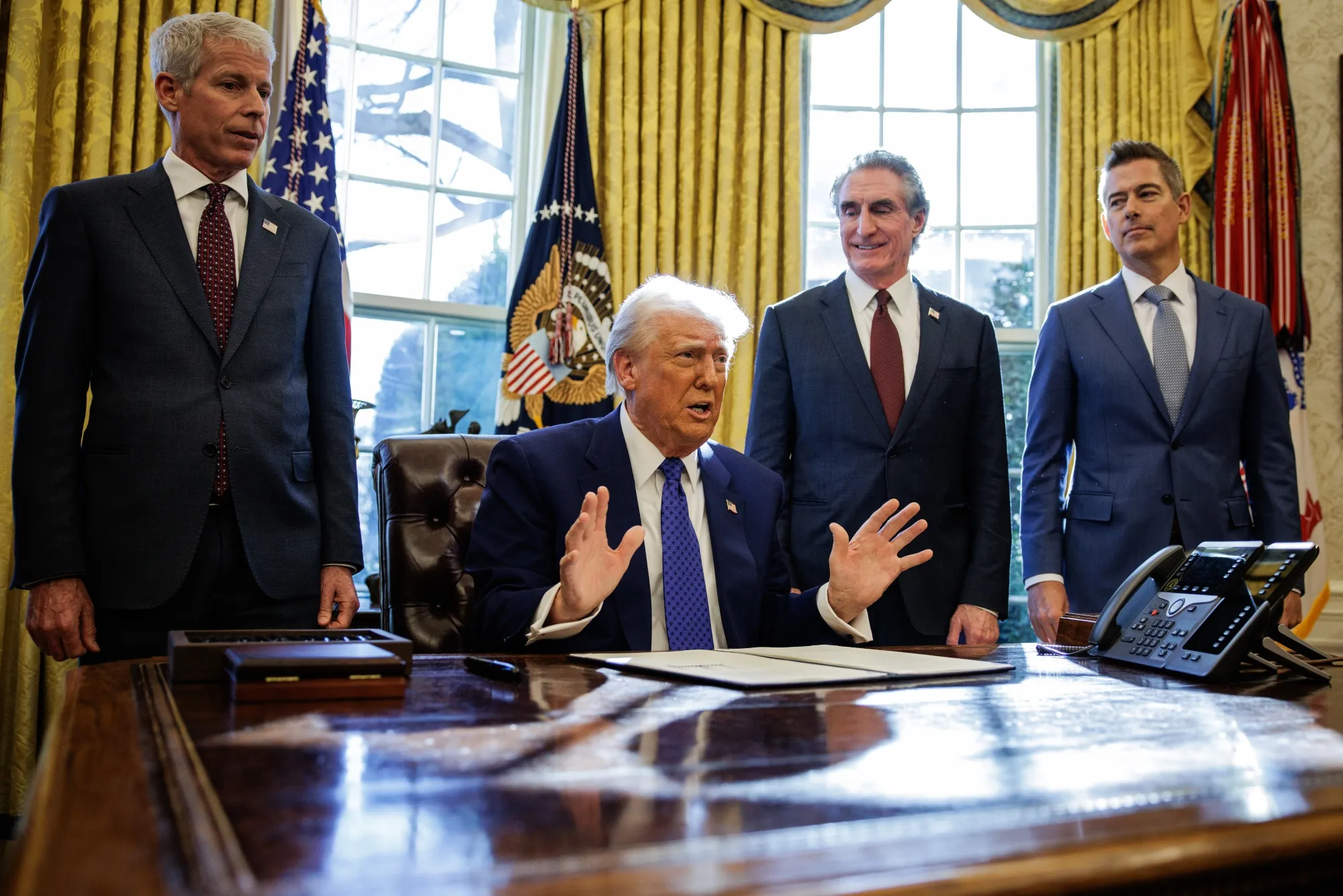 Donald Trump speaks during an executive order signing in the Oval Office of the White House on Feb. 14.