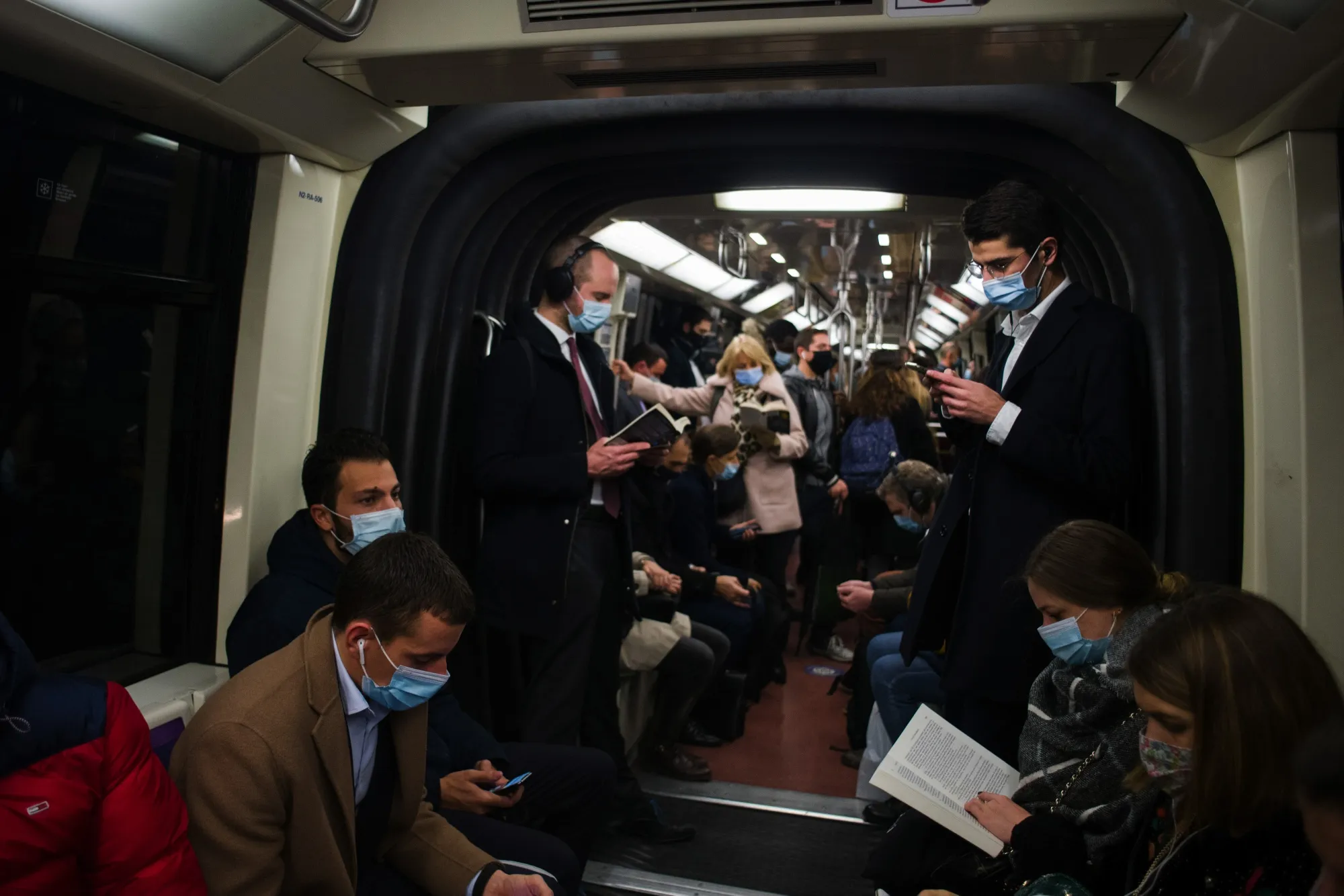 Morning rush hour commuters on busy metro train in Paris, France, on Oct. 14