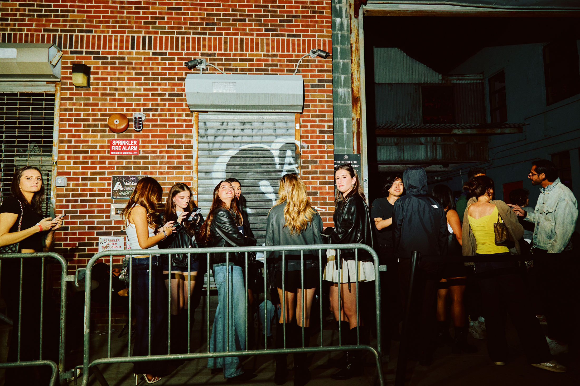 People wait in line outside Elsewhere, a multiroom music venue, nightclub and arts space in the Bushwick neighborhood of Brooklyn.&nbsp;