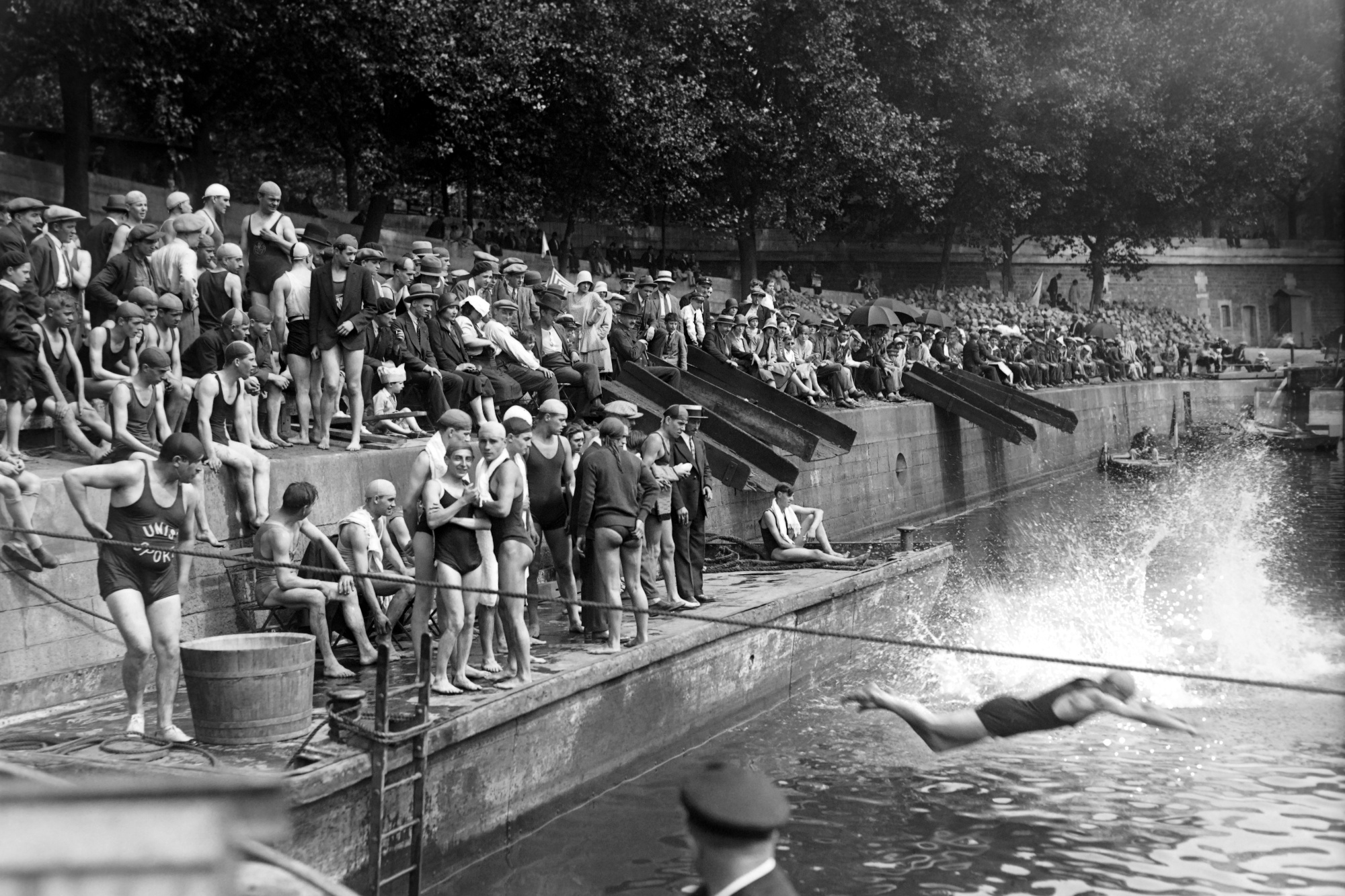 Swimmers Diving In The Seine River