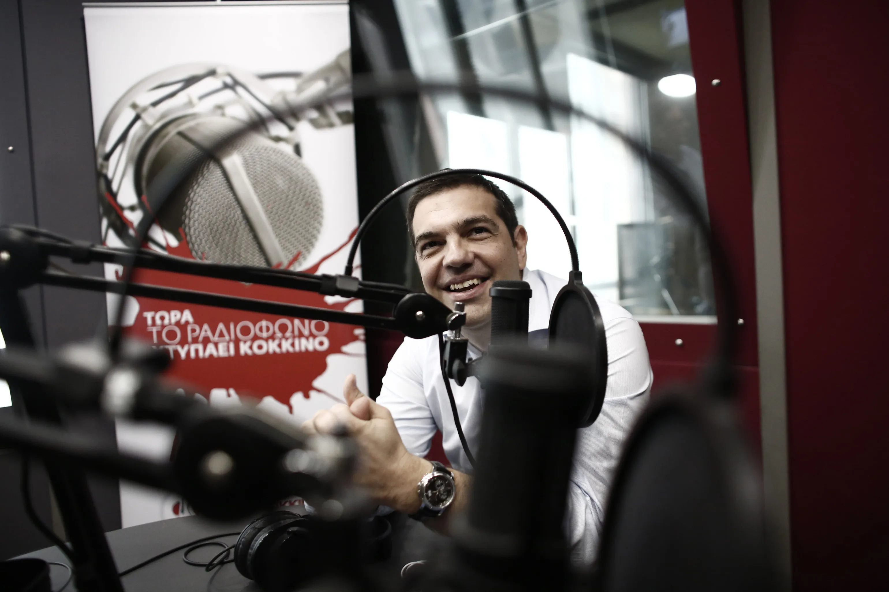Alexis Tsipras, Greece's prime minister, speaks during a live interview at Sto Kokkino radio station in Athens, Greece, on Wednesday, July 29, 2015.
