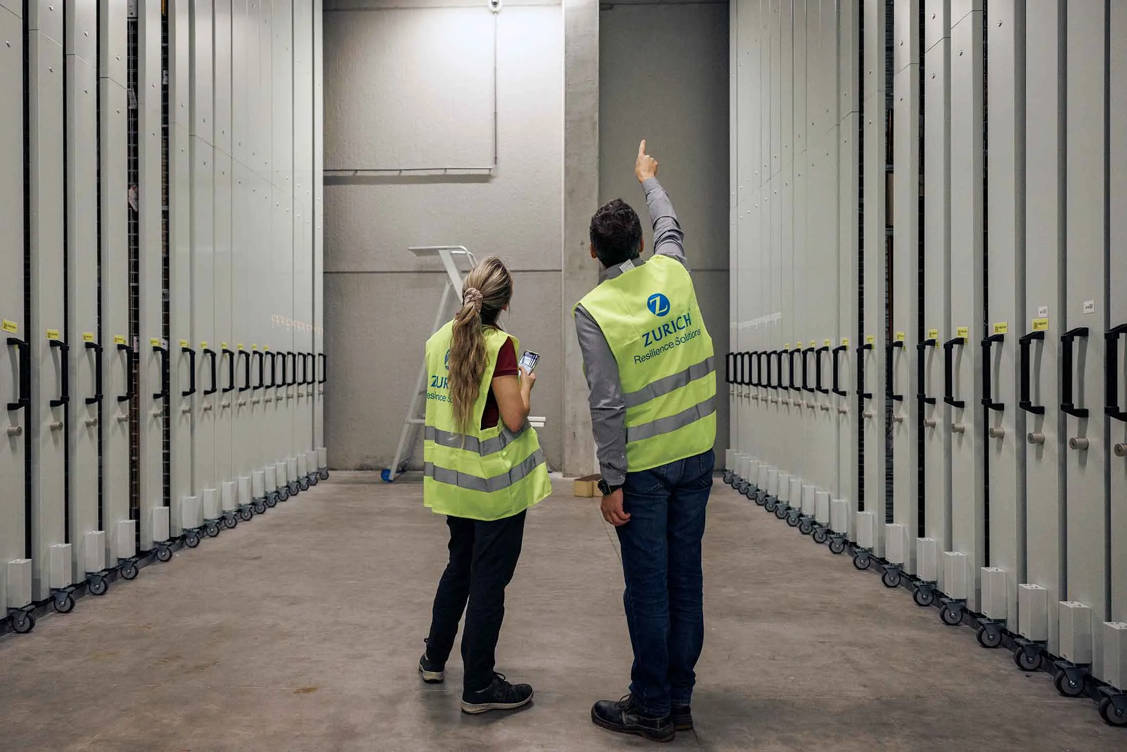 Climate risk engineers&nbsp;inspect&nbsp;a warehouse.