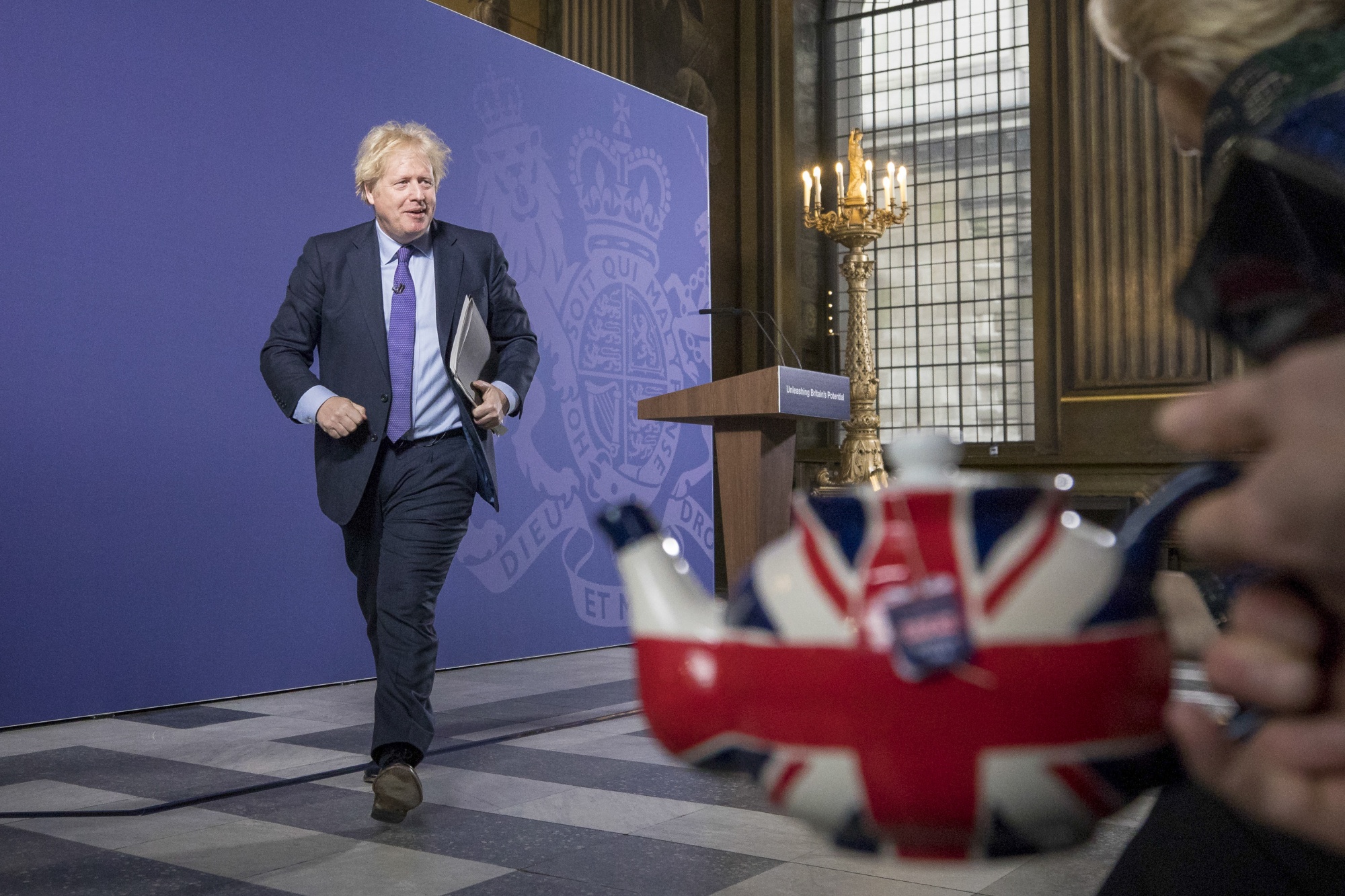 Boris Johnson departs following a speech on &quot;Unleashing Britain's Potential&quot; at the Old Royal Naval College in London, on Feb. 3.
