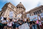 Demonstrators take part in the Women's March and Rally for Abortion Justice at the State Capitol in Austin, Texas.