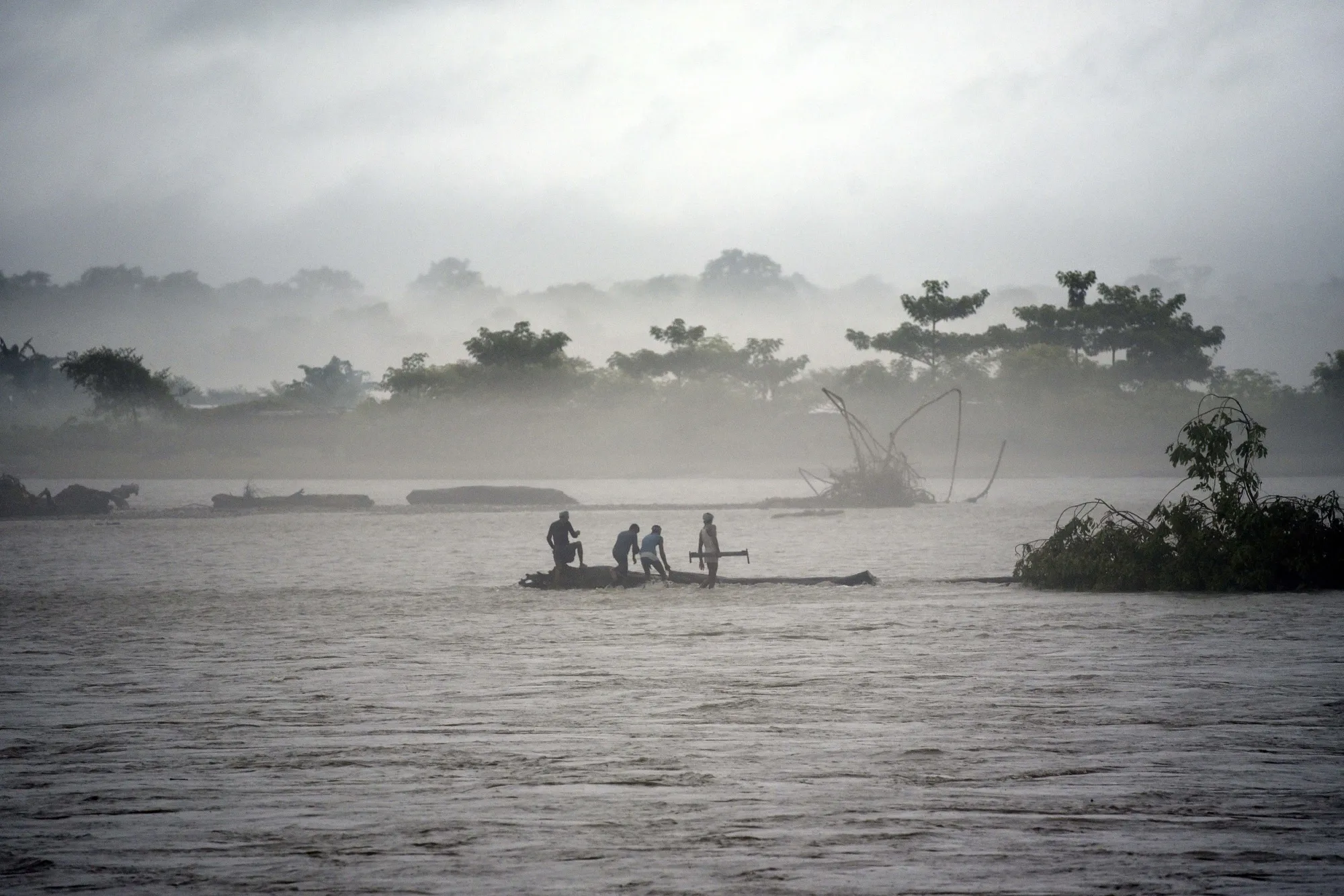 Flooded Manas river bank following heavy rainfall in Assam, July 15.