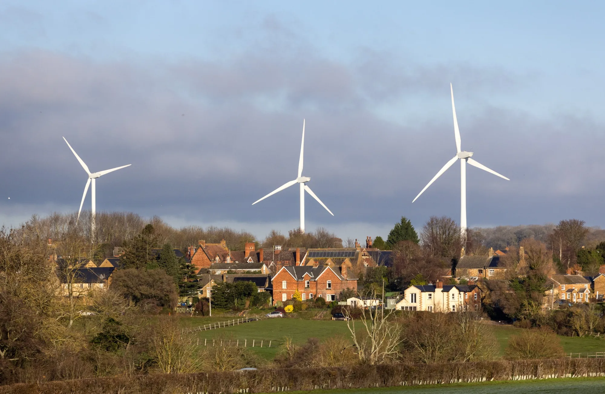 Wind turbines near the town of Rushton, UK.